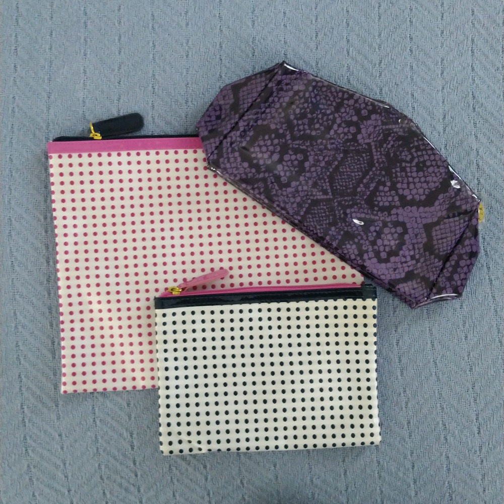Three Estee Lauder cosmetic bags - unused